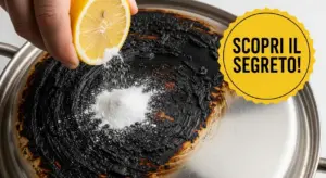 Pentola con fondo bruciato mentre viene pulita con limone e bicarbonato